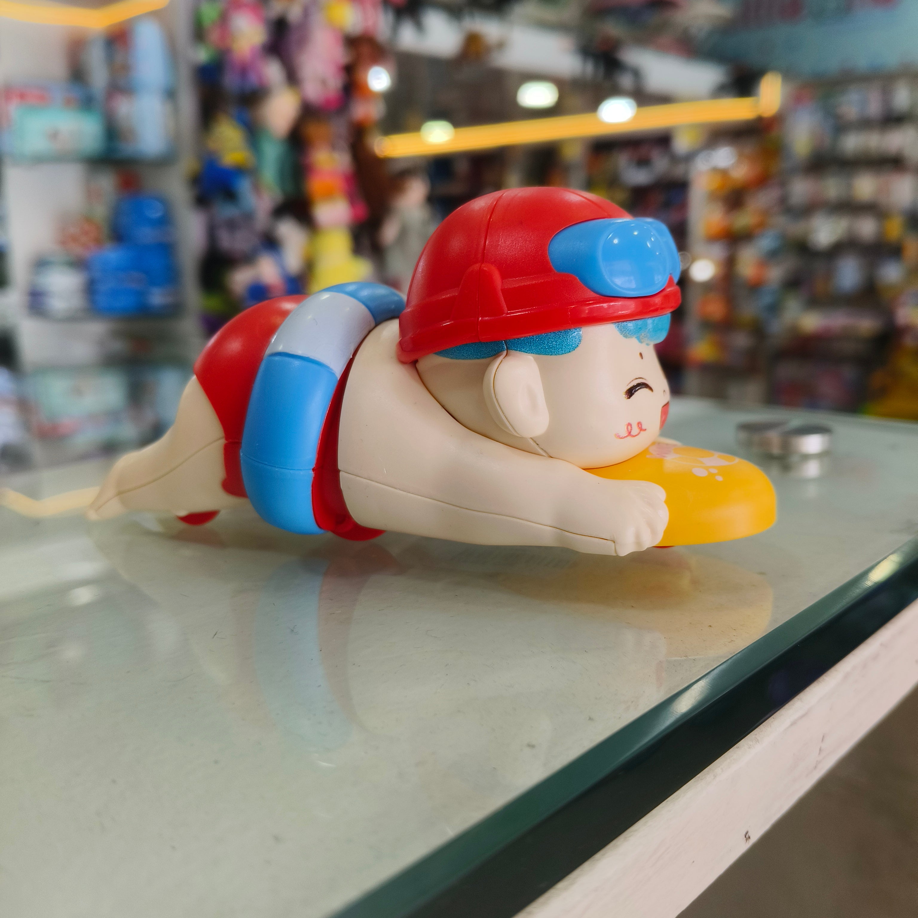 Swimmer Boy Surfboard Wind-Up Water & Floor Toy